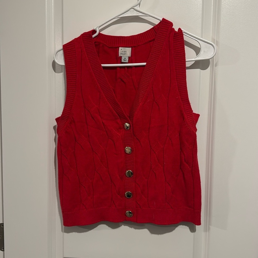 Red sweater vest